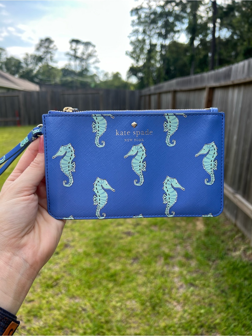 kate spade blue wristlet with mint seahorse novelty print